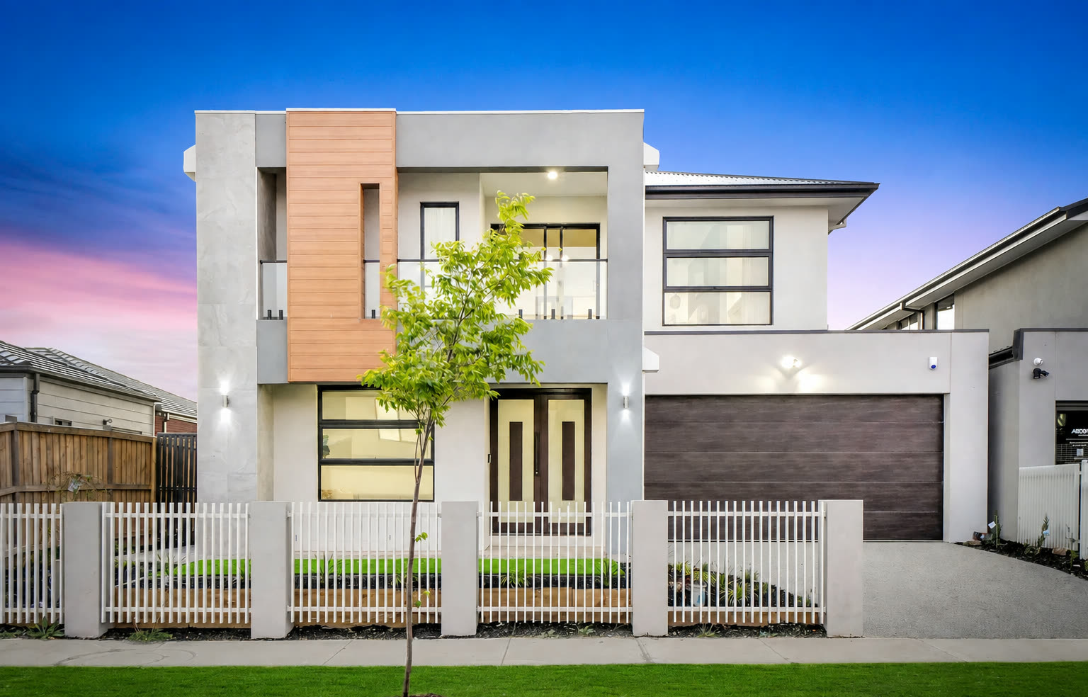 Monferrato Avenue, Tarneit. A visualisation of a two storey home in Tarneit at twilight.